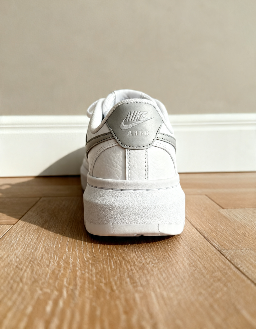 Court Vision Alta sneakers in a white and Grey color