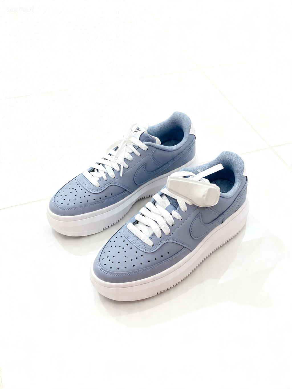 Court Vision Alta sneakers in white and blue