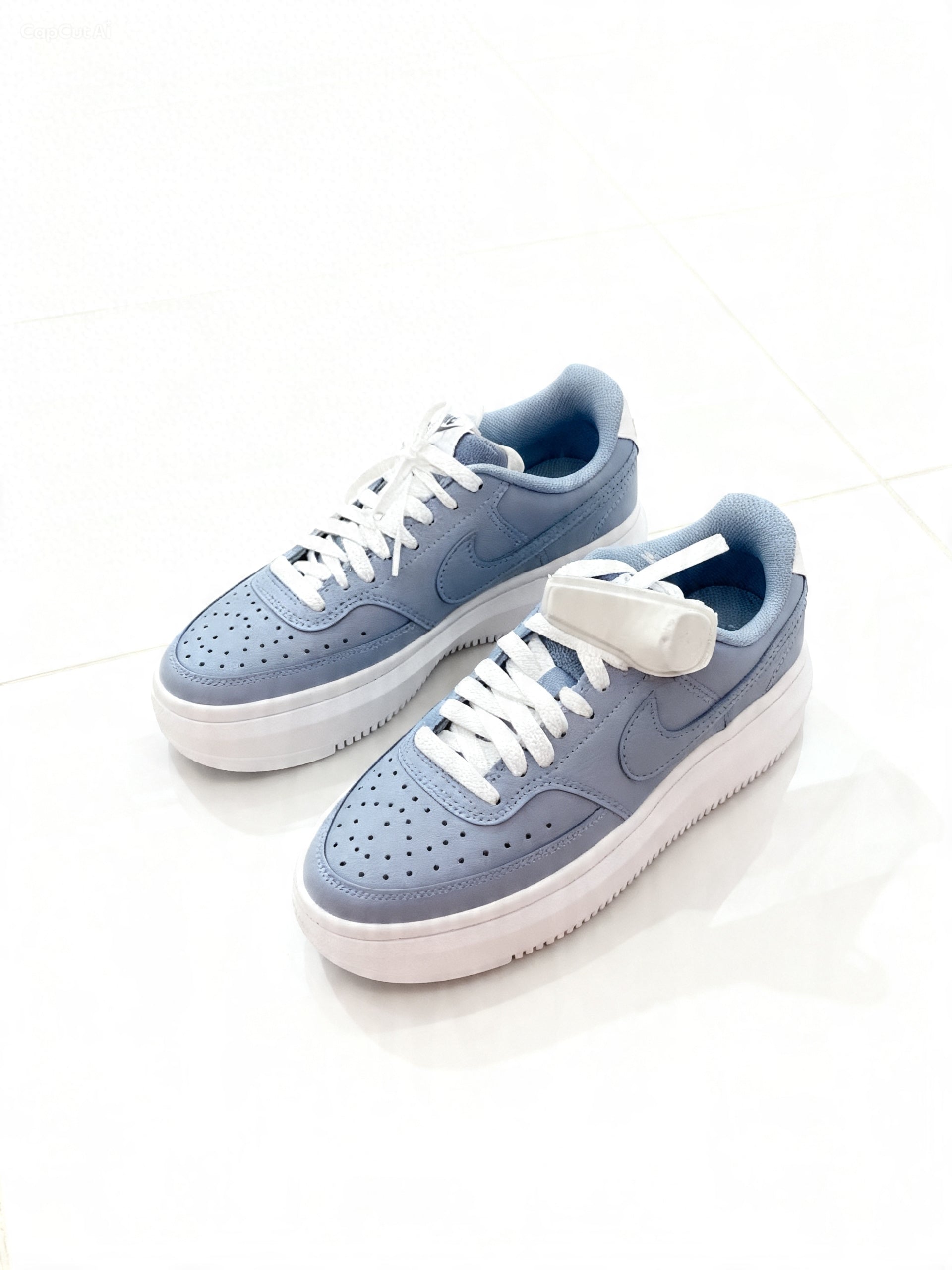 Court Vision Alta sneakers in white and blue